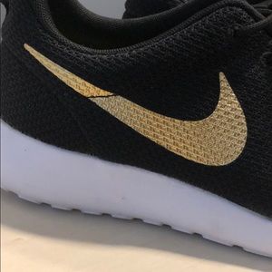 Nike Shoes - Black with gold Nike swoosh Nike Shoes - Black with gold Nike swoosh